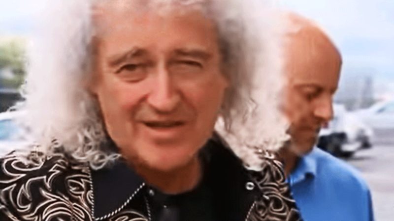 "What a parasite you are," Brian May tells off Aussie news cameraman